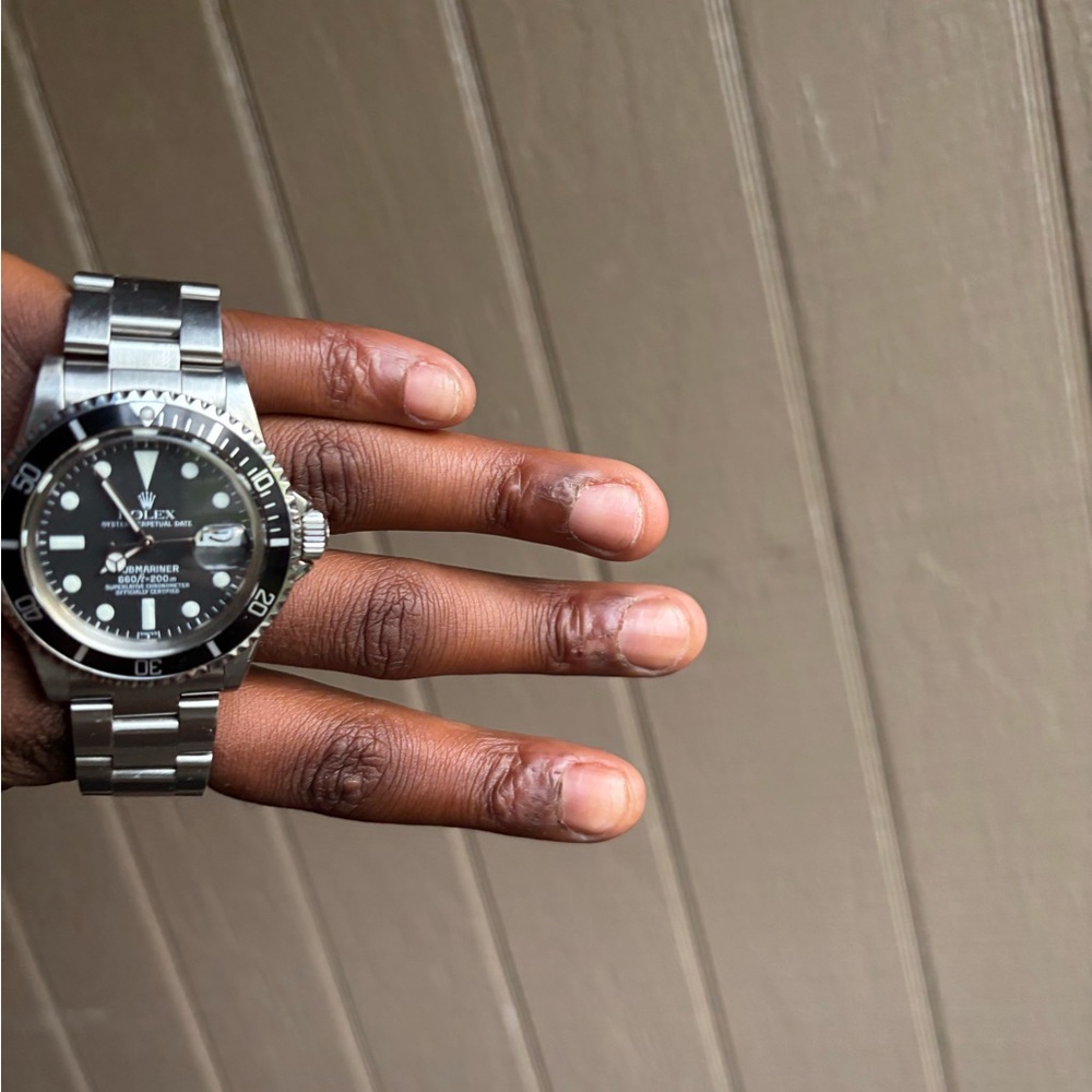 Rolex Silver and Black Watch